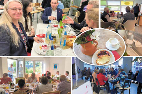 Viele Menschen an einem Tisch beim essen