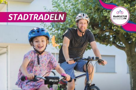 Mann und Mädchen auf Fahrrad
